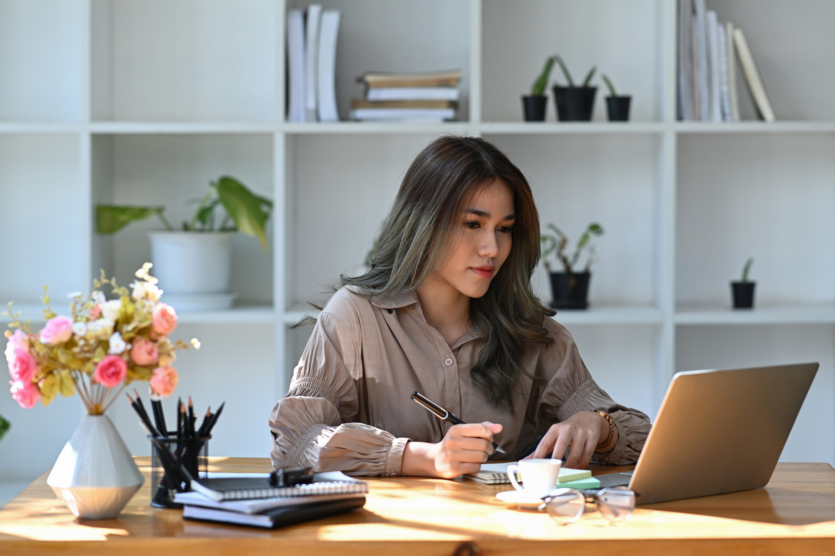 Woman Working at Her Office Desk 